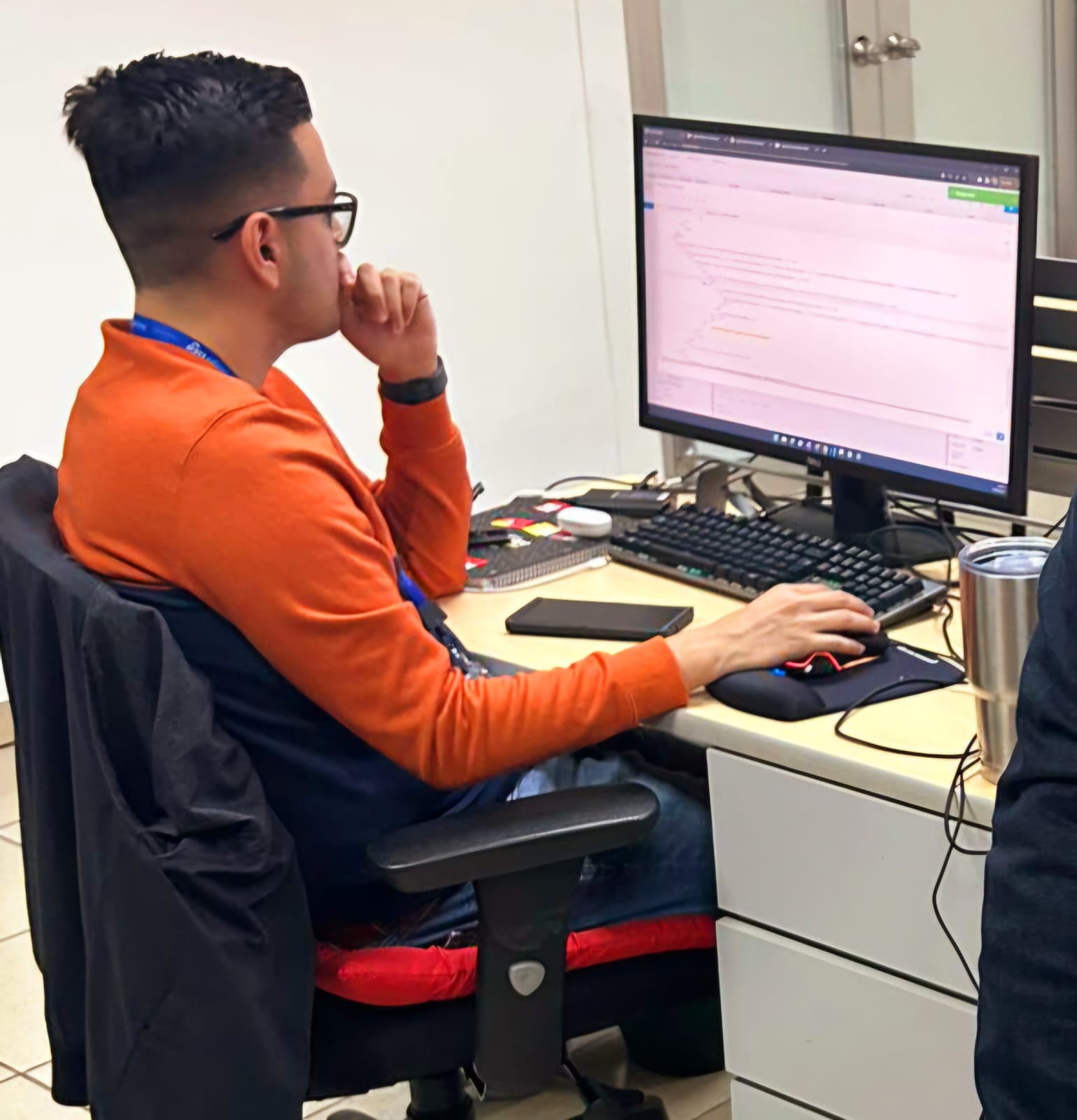 Kevin Nieto at work with a colleague